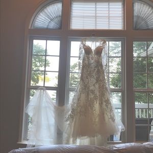 Wedding Dress never worn, climate control wardrobe room.